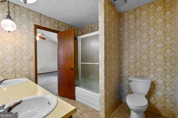 a view of a room with a chandelier