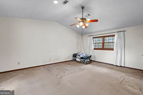 a view of an empty room with window