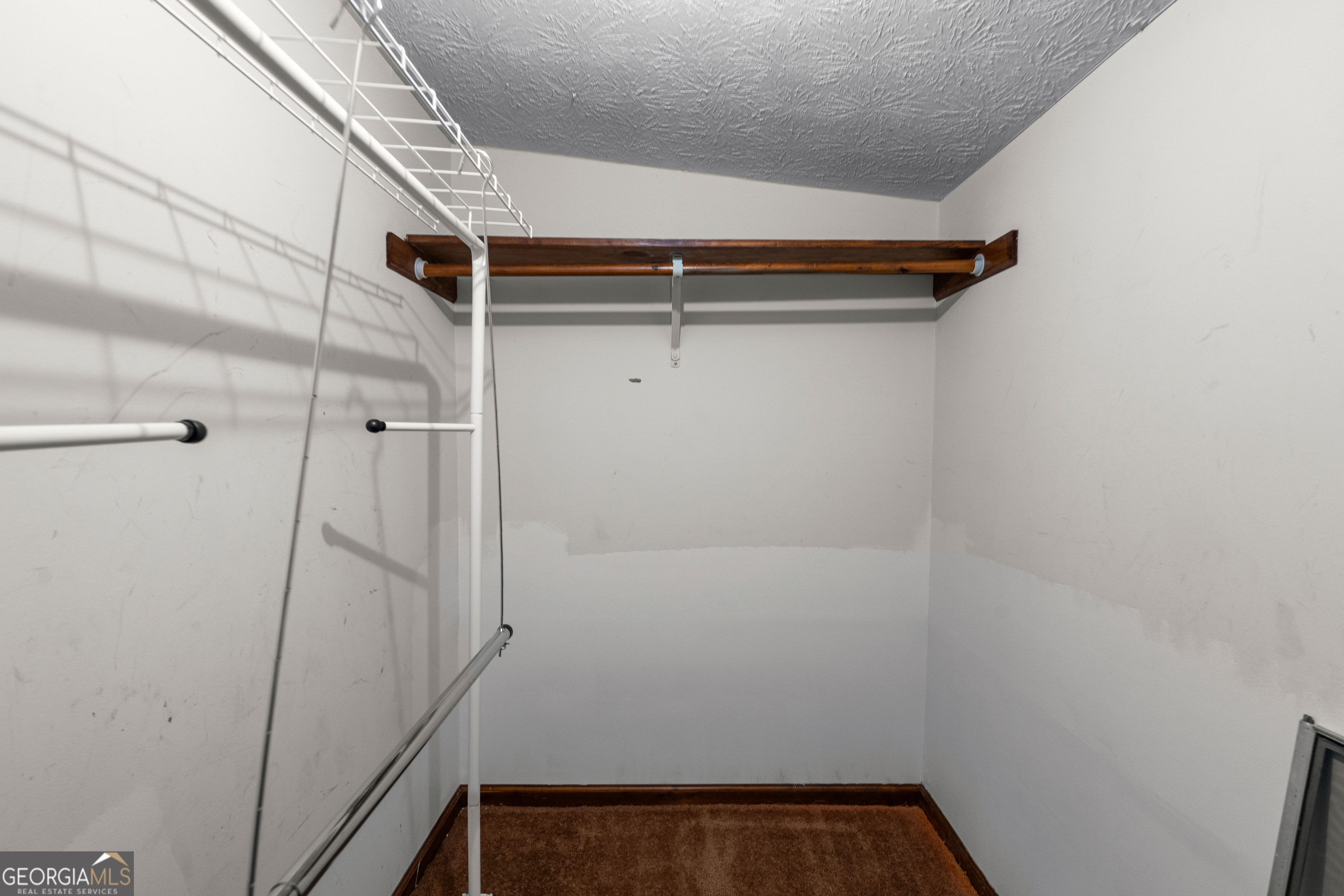 447 Adams Road Fayetteville, GA 30214 - Photo 42 of 52 a view of walk in closet