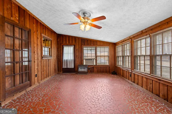 a view of a kitchen from the hallway