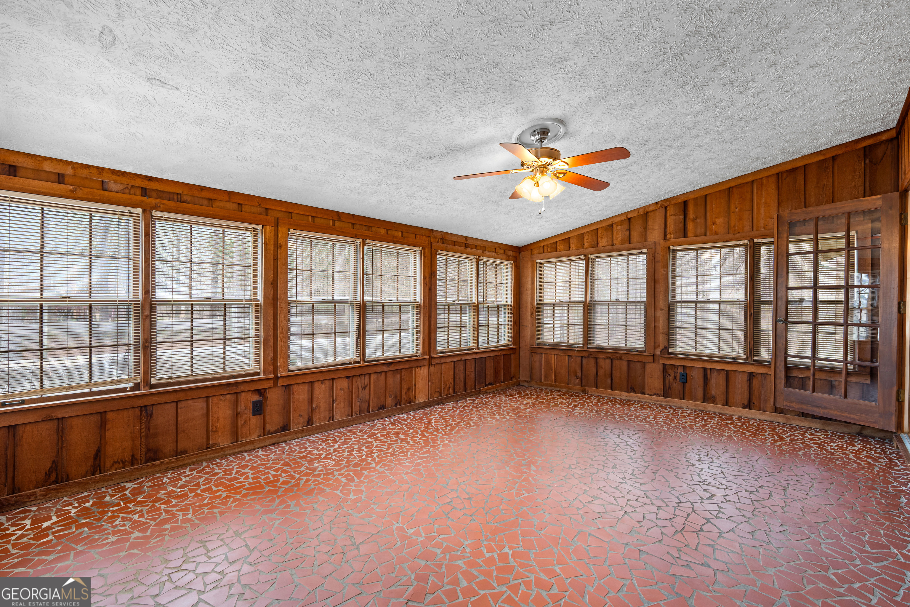 447 Adams Road Fayetteville, GA 30214 - Photo 46 of 52 wooden floor in an empty room with a large window