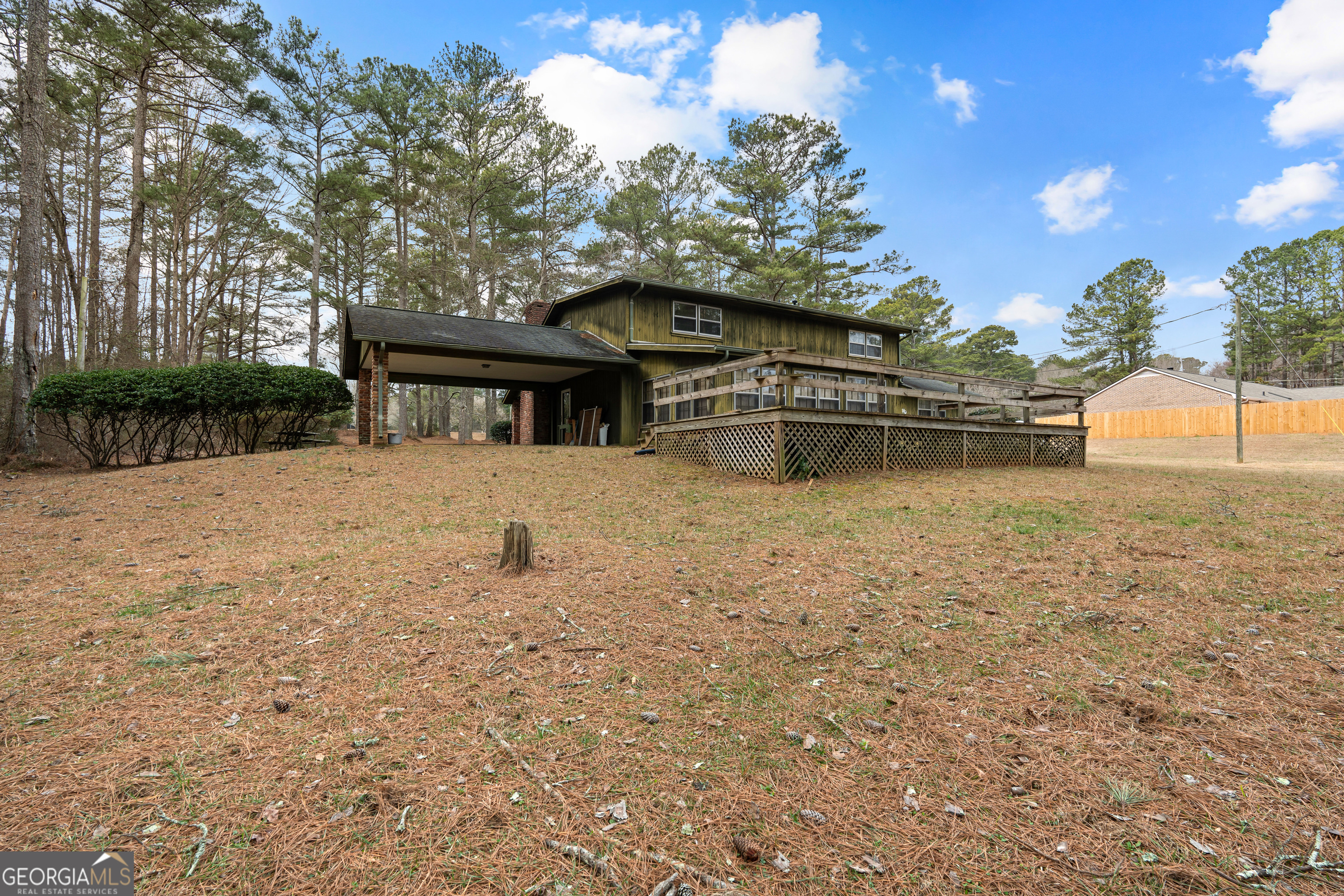 447 Adams Road Fayetteville, GA 30214 - Photo 49 of 52 a front view of a house with a yard