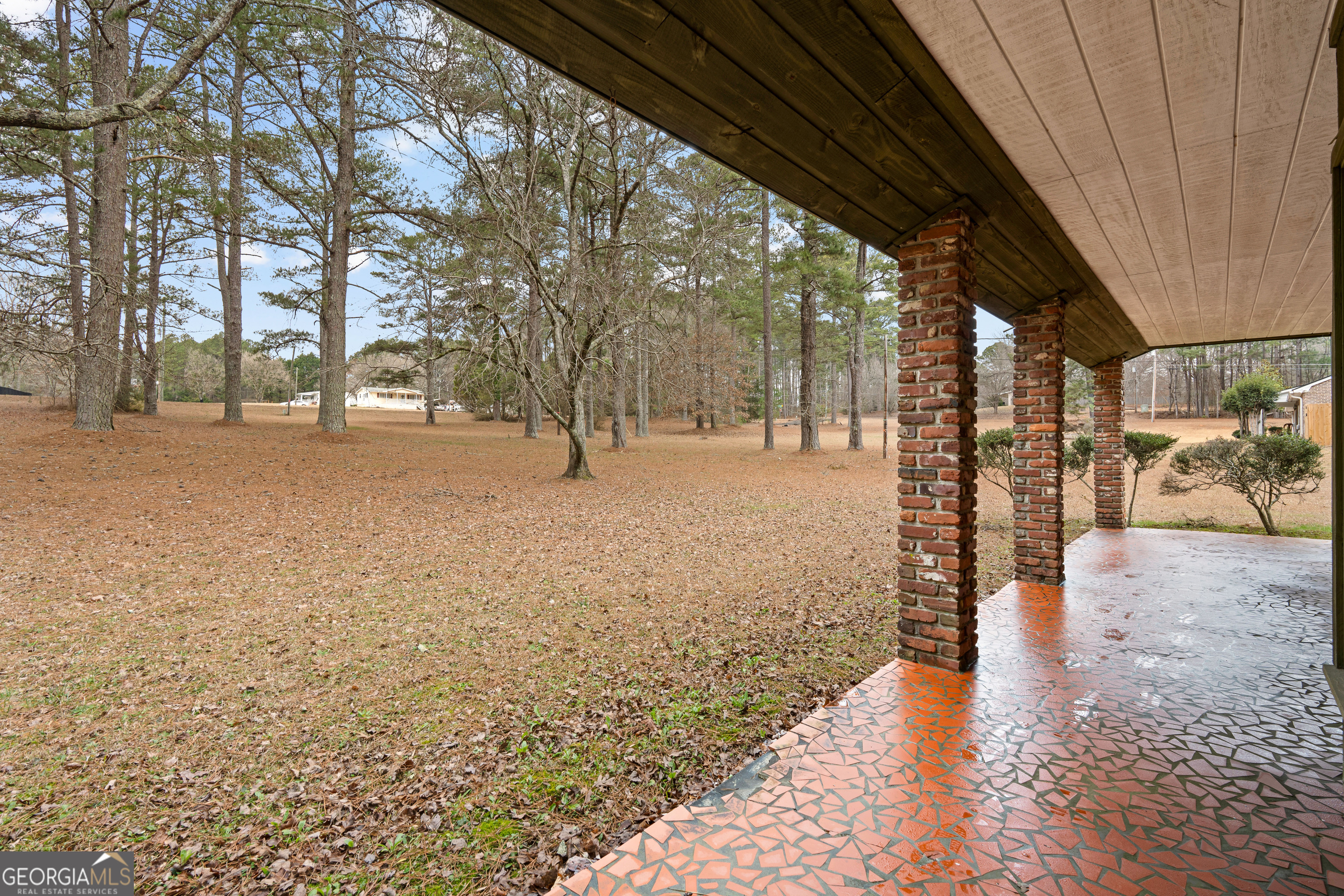 447 Adams Road Fayetteville, GA 30214 - Photo 5 of 52 a view of empty room with trees