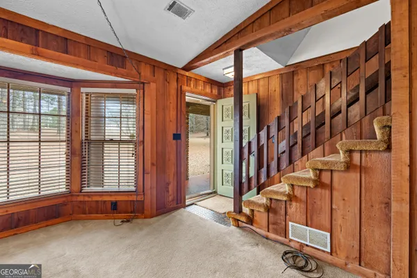 a view of front door with stairs