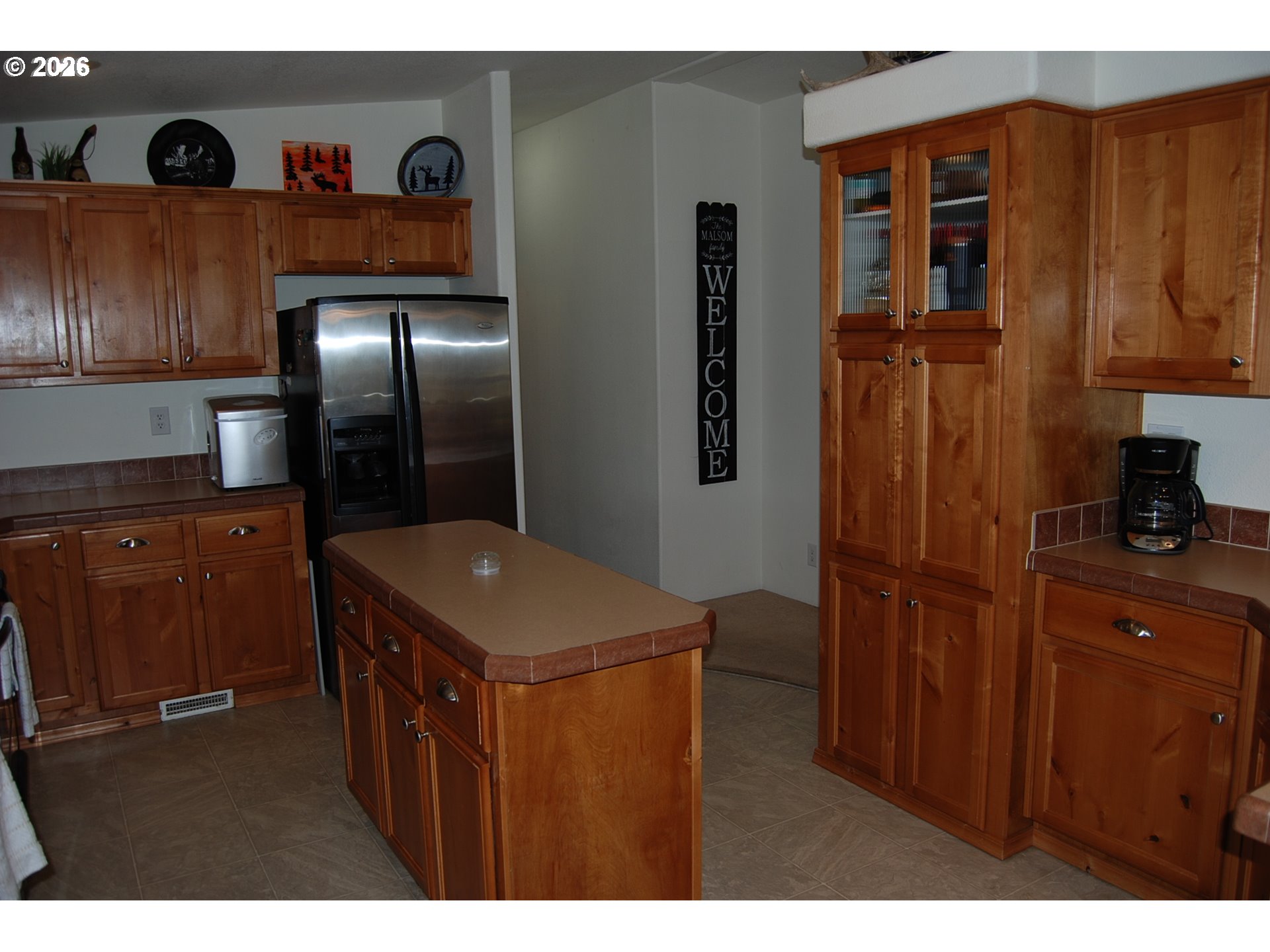 38987 Deer Creek Road Baker City, OR 97814 - Photo 11 of 45 a kitchen with stainless steel appliances granite countertop a refrigerator a stove and a sink