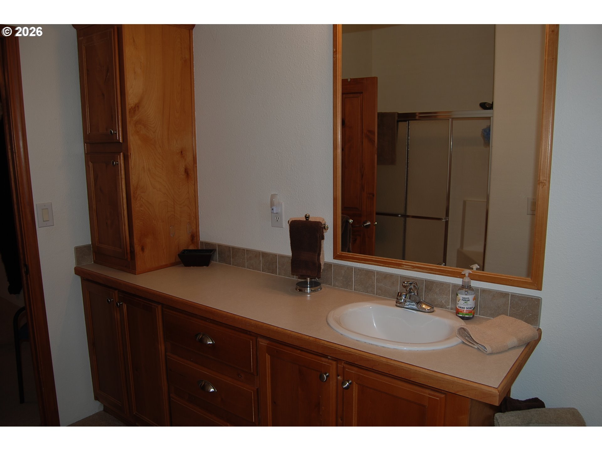 38987 Deer Creek Road Baker City, OR 97814 - Photo 29 of 45 a bathroom with a sink and a mirror