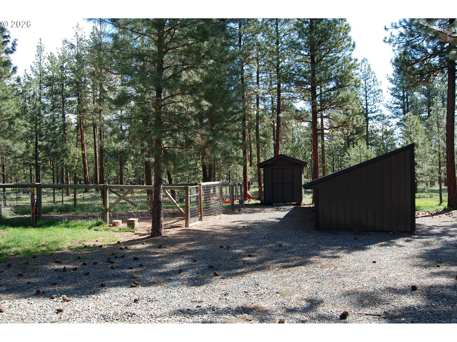 38987 Deer Creek Road Baker City, OR 97814 - Photo 31 of 45 a view of a backyard with trees