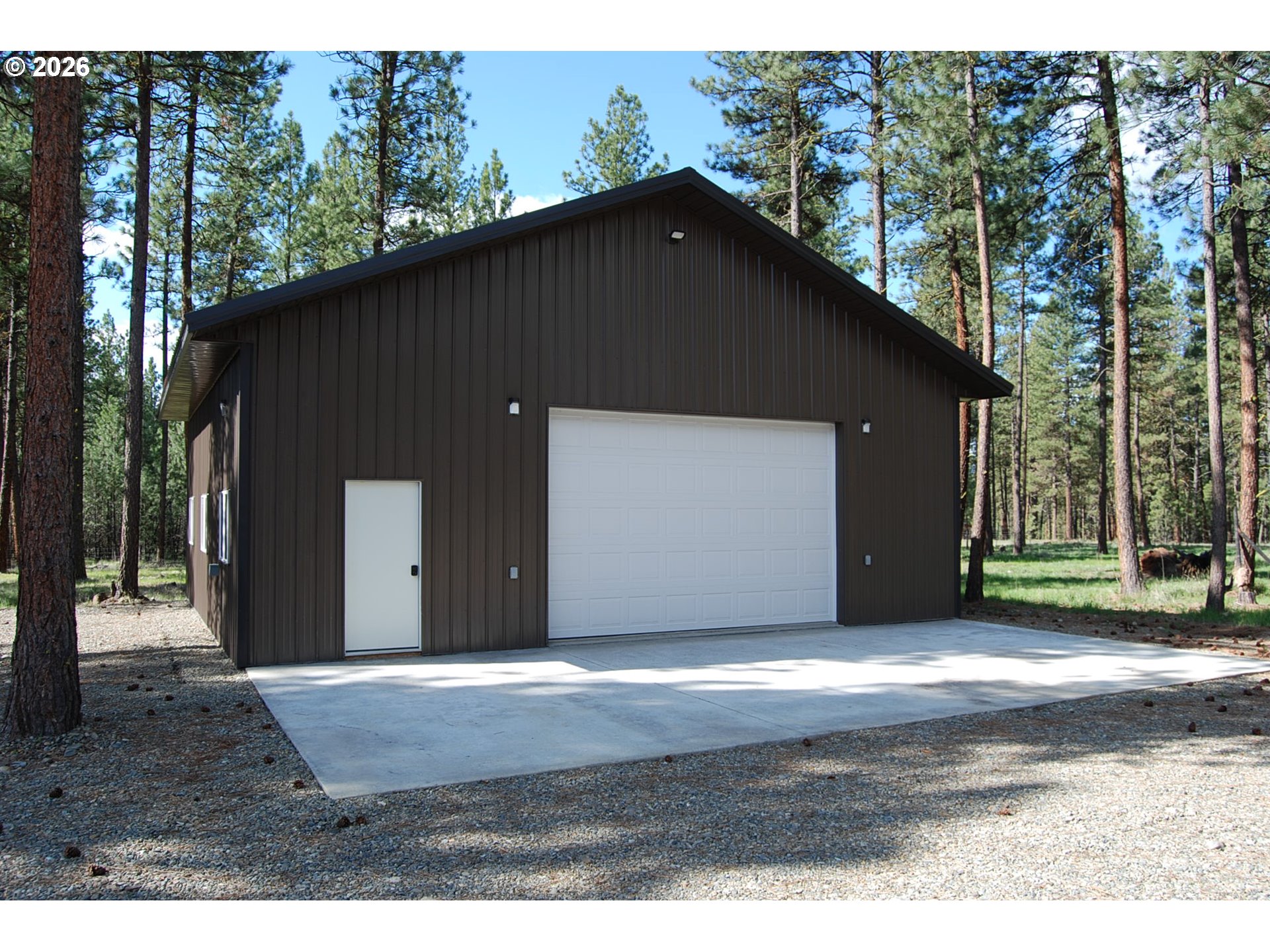 38987 Deer Creek Road Baker City, OR 97814 - Photo 37 of 45 a front view of a house with a yard