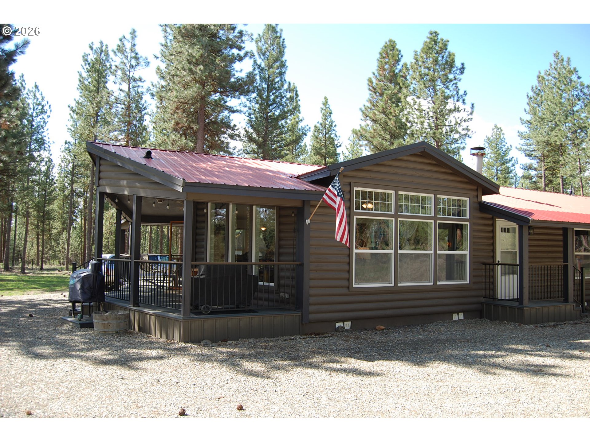 38987 Deer Creek Road Baker City, OR 97814 - Photo 40 of 45 a front view of a house with a garden