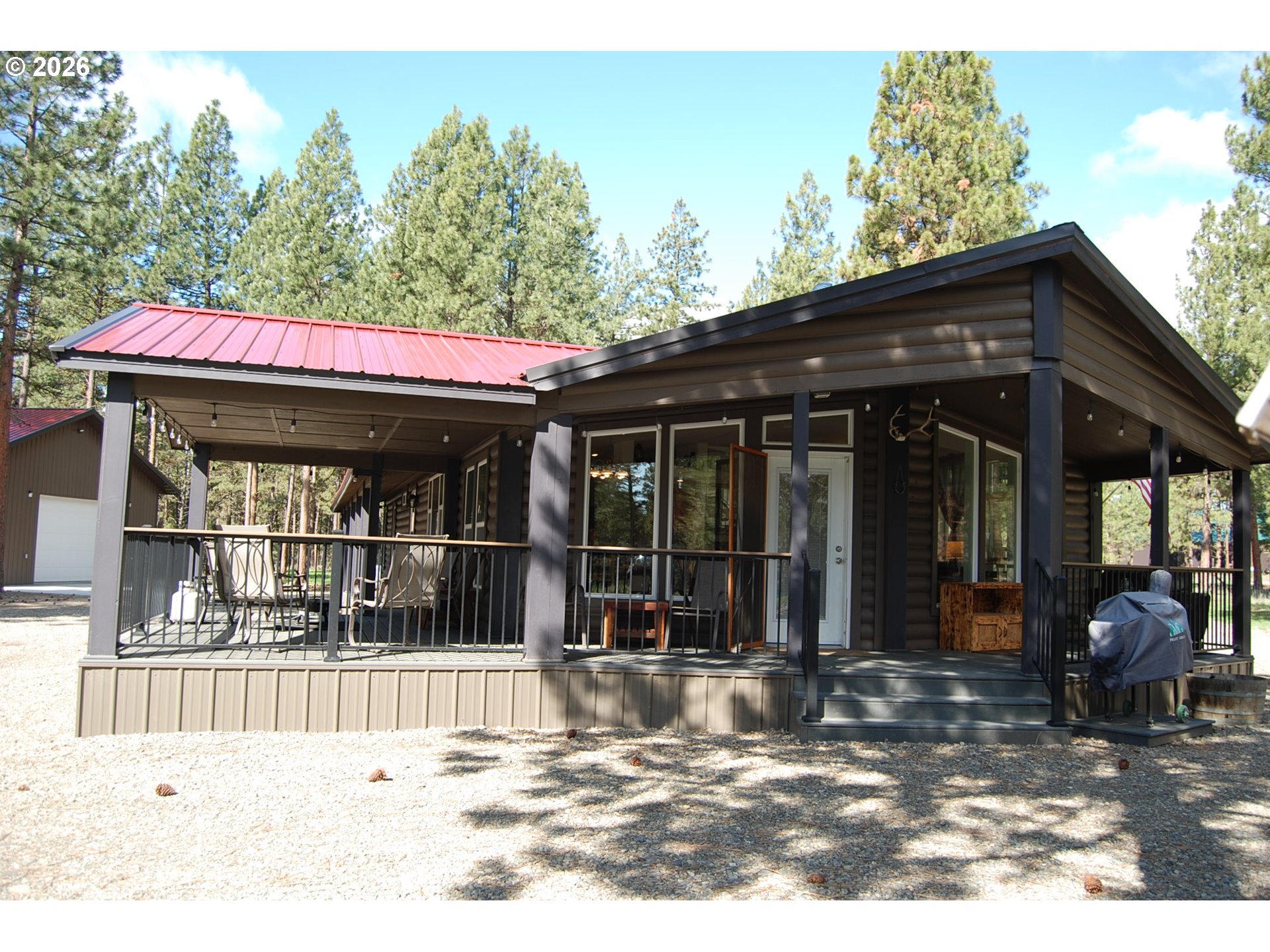 38987 Deer Creek Road Baker City, OR 97814 - Photo 41 of 45 a view of a house with outdoor seating