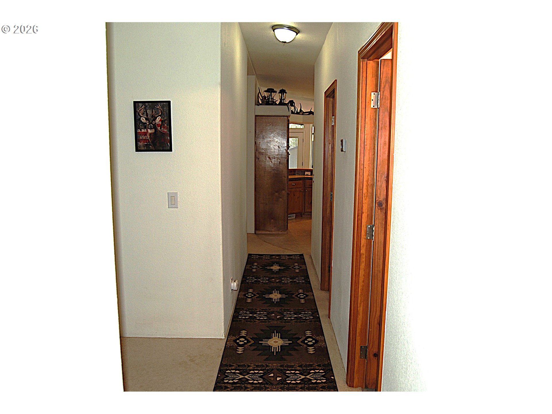 38987 Deer Creek Road Baker City, OR 97814 - Photo 44 of 45 a hallway with wooden floor