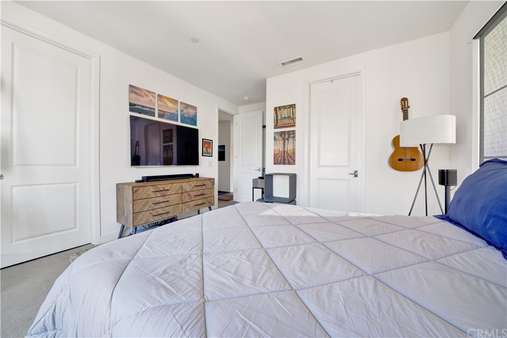 3197 Doheny Way Dana Point, CA 92629 - Photo 12 of 28 a bed room with a bed a television and a window