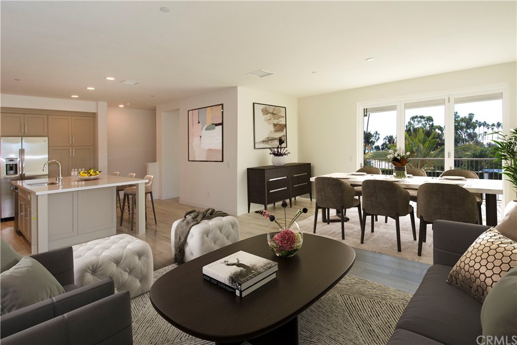 3197 Doheny Way Dana Point, CA 92629 - Photo 8 of 28 a living room with furniture kitchen view and a large window