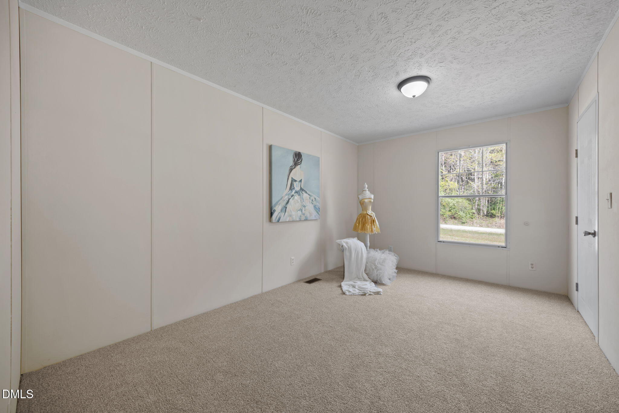 721 General Green Road Kittrell, NC 27544 - Photo 27 of 36 a living room with furniture and a window