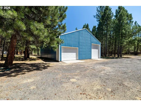 a view of a town with pathway