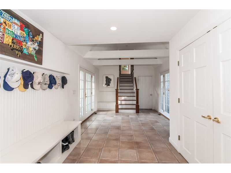 5 Dorchester Lane Riverside, CT 06878 - Photo 11 of 22 a view of a livingroom with a staircase