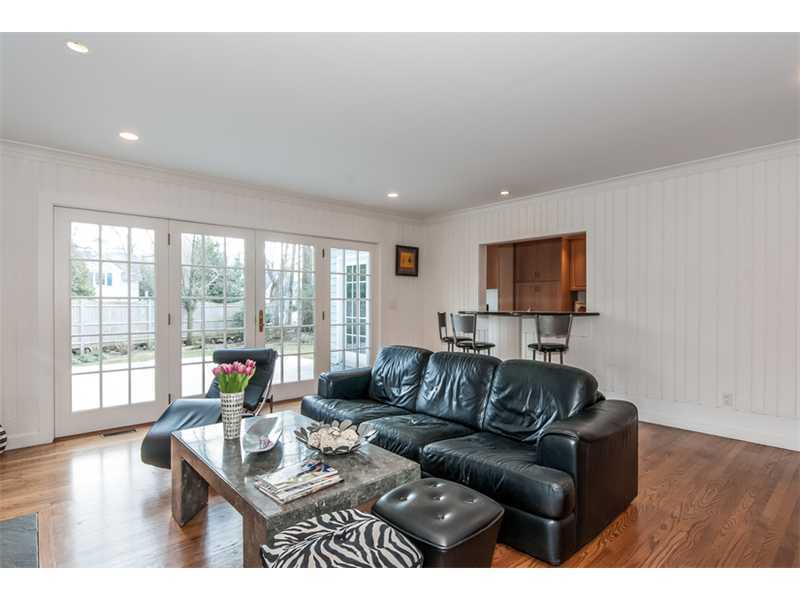 5 Dorchester Lane Riverside, CT 06878 - Photo 7 of 22 a living room with furniture and a flat screen tv