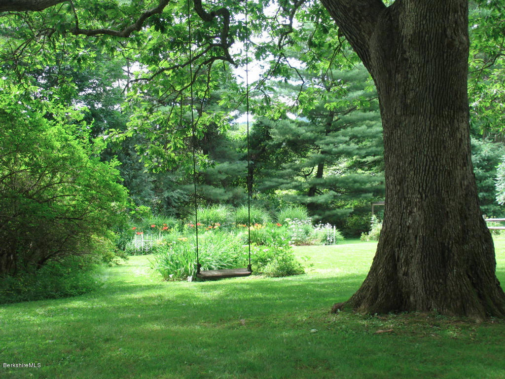 570 Devon Road Lee, MA 01238 - Photo 2 of 42 a view of a garden with a tree