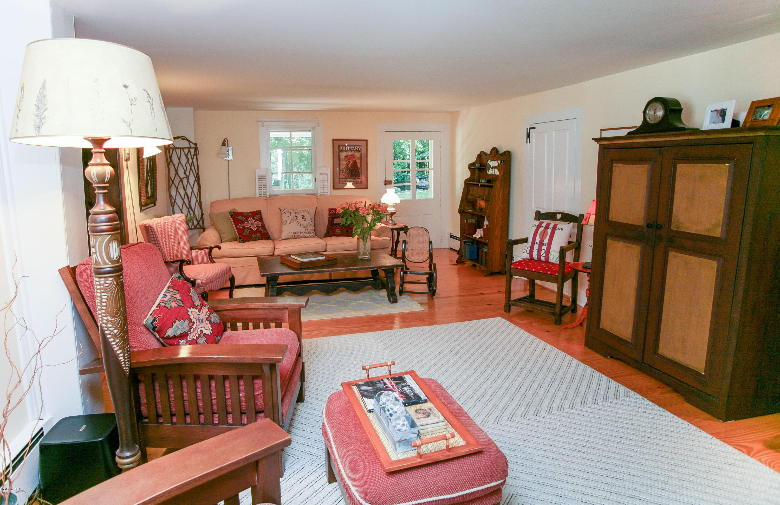 570 Devon Road Lee, MA 01238 - Photo 18 of 42 a living room with furniture a rug and a window