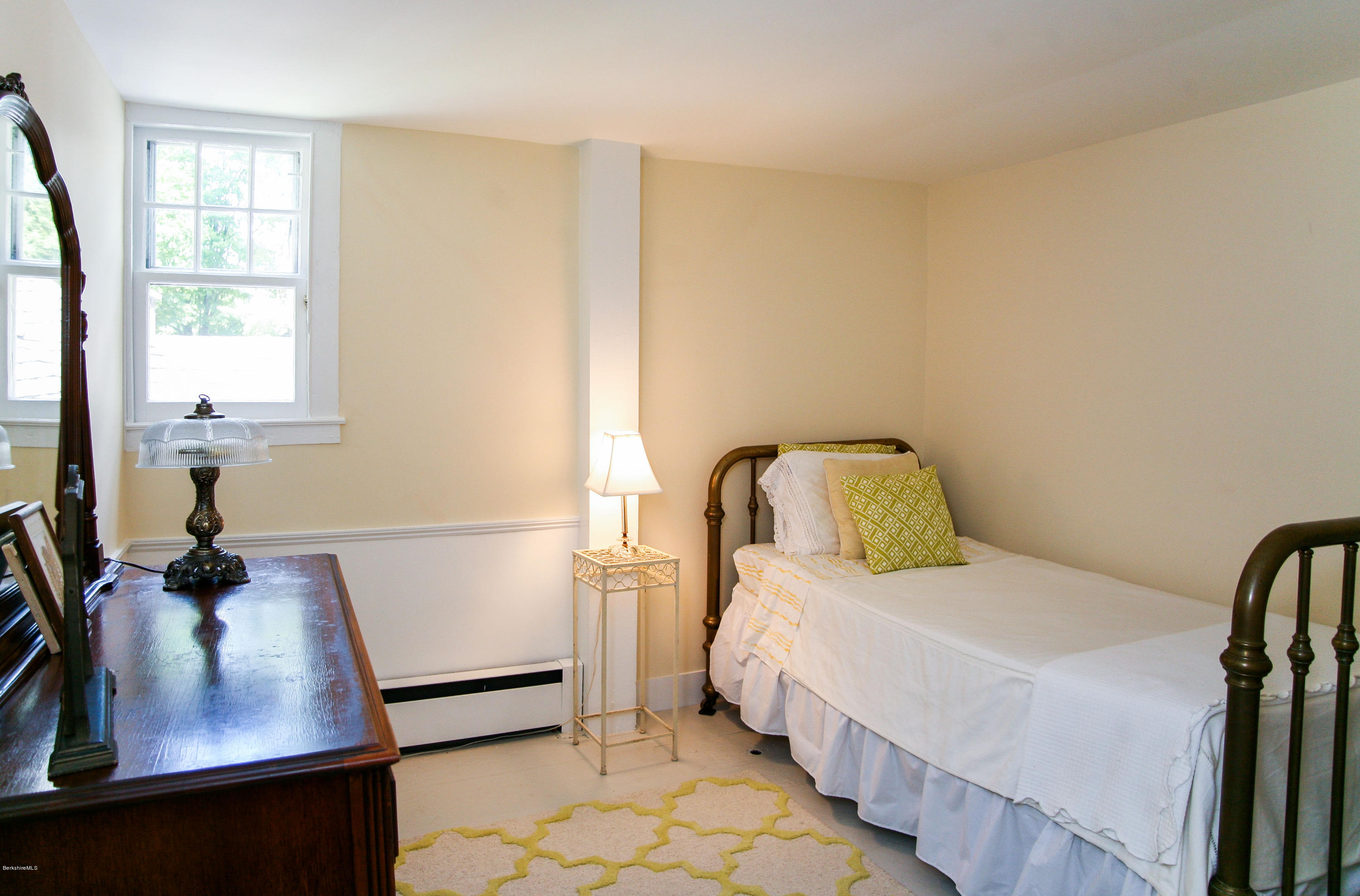570 Devon Road Lee, MA 01238 - Photo 26 of 42 a bedroom with a bed and a window