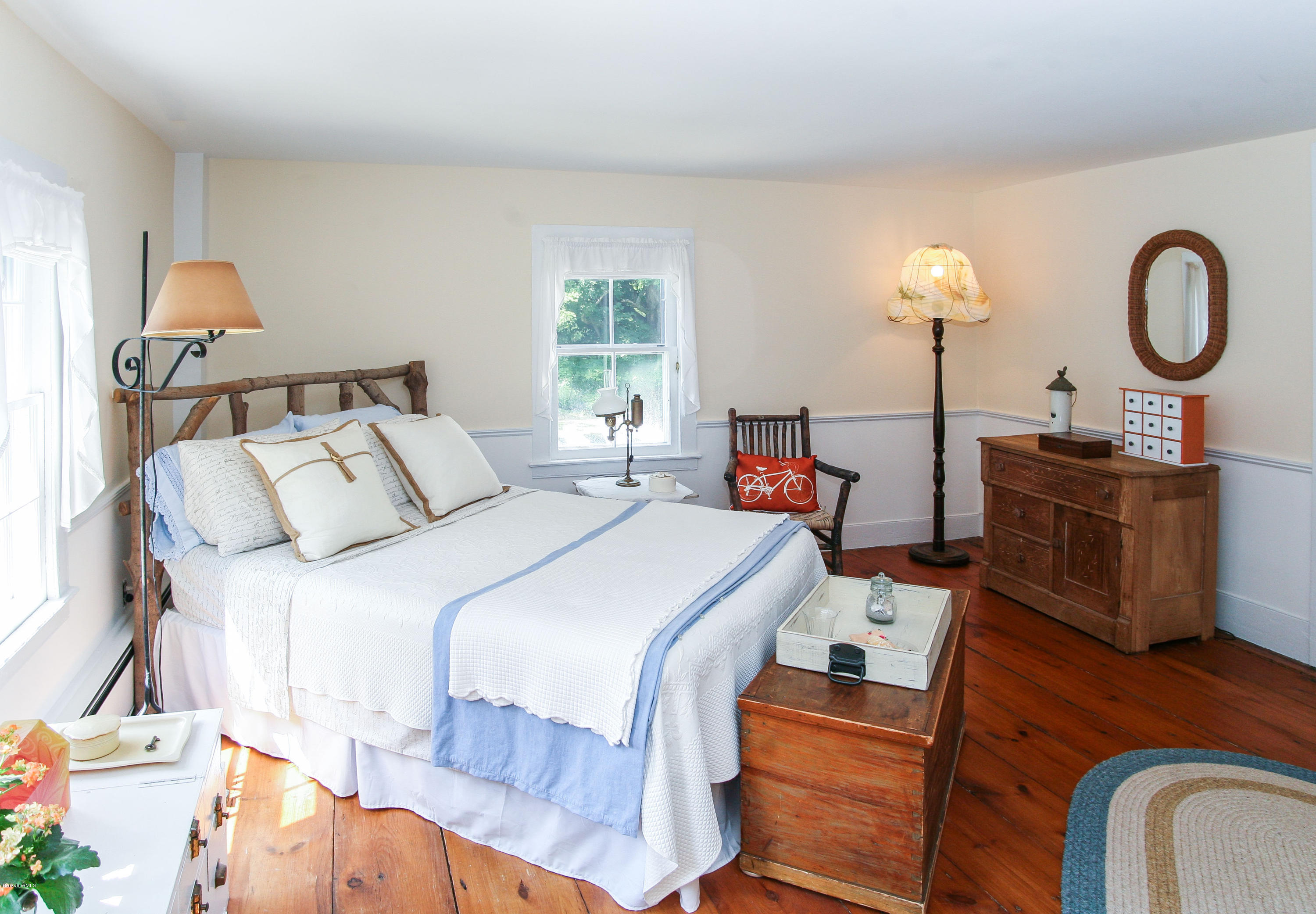 570 Devon Road Lee, MA 01238 - Photo 29 of 42 a bed room with a bed and a large window