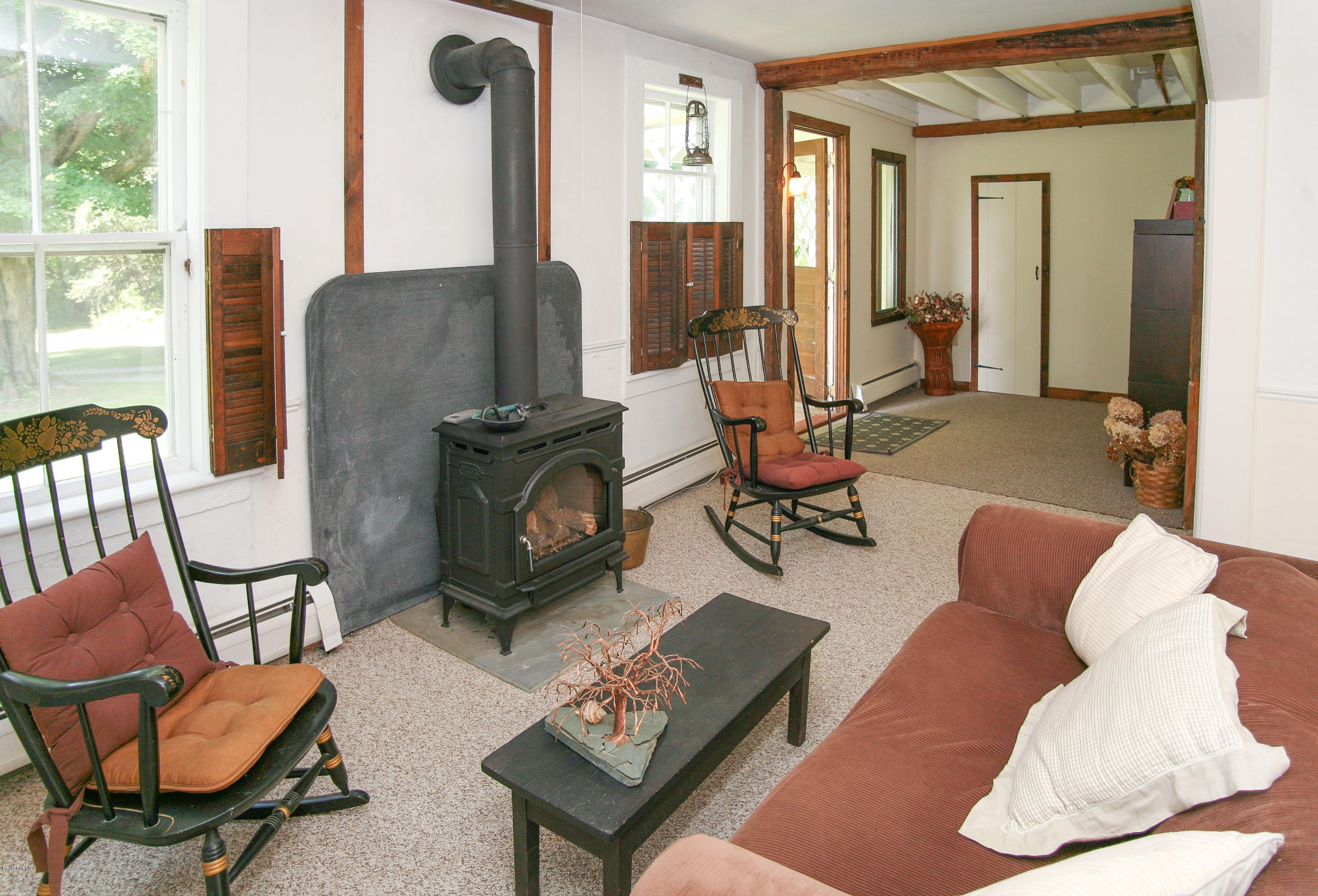 570 Devon Road Lee, MA 01238 - Photo 35 of 42 a living room with furniture and a fireplace
