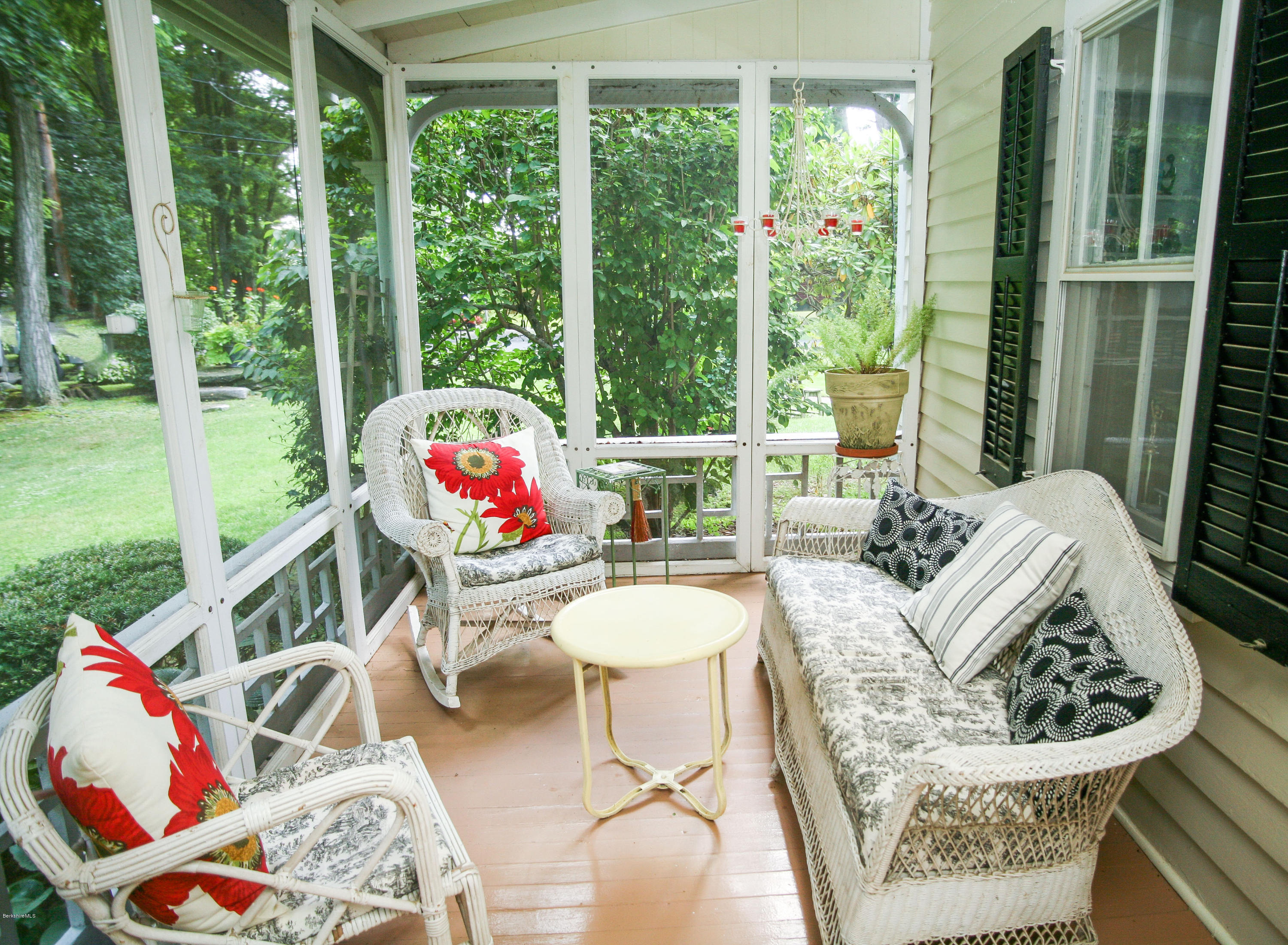 570 Devon Road Lee, MA 01238 - Photo 39 of 42 a living room with patio furniture and a large window