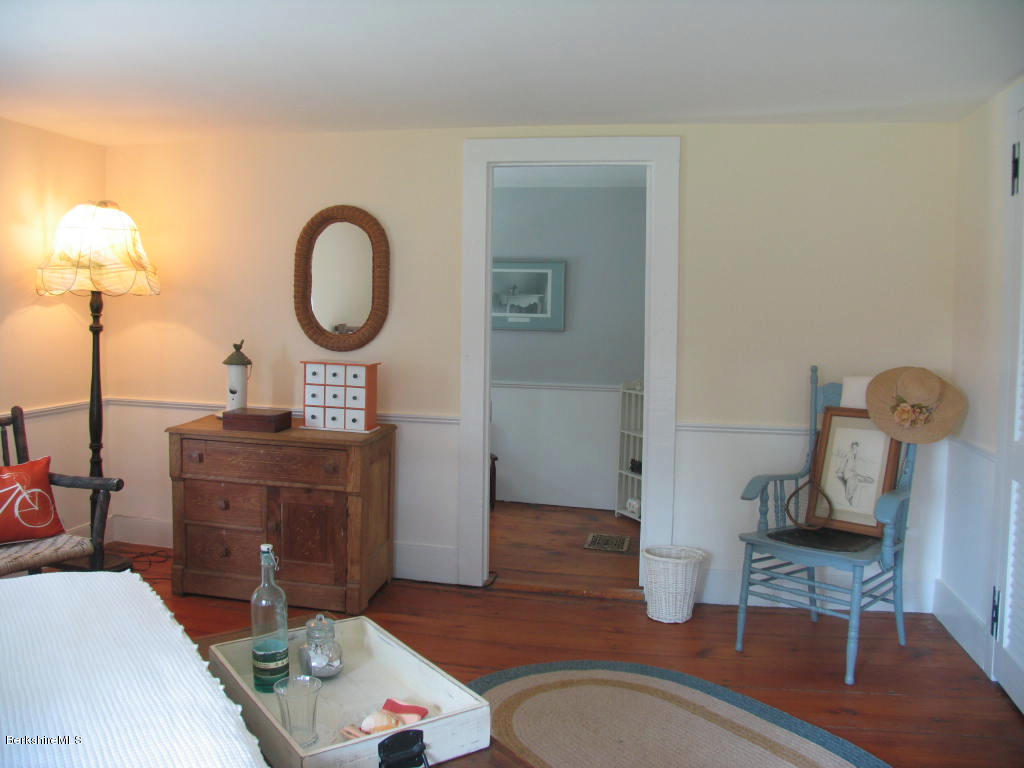 570 Devon Road Lee, MA 01238 - Photo 6 of 42 a room with furniture and a mirror