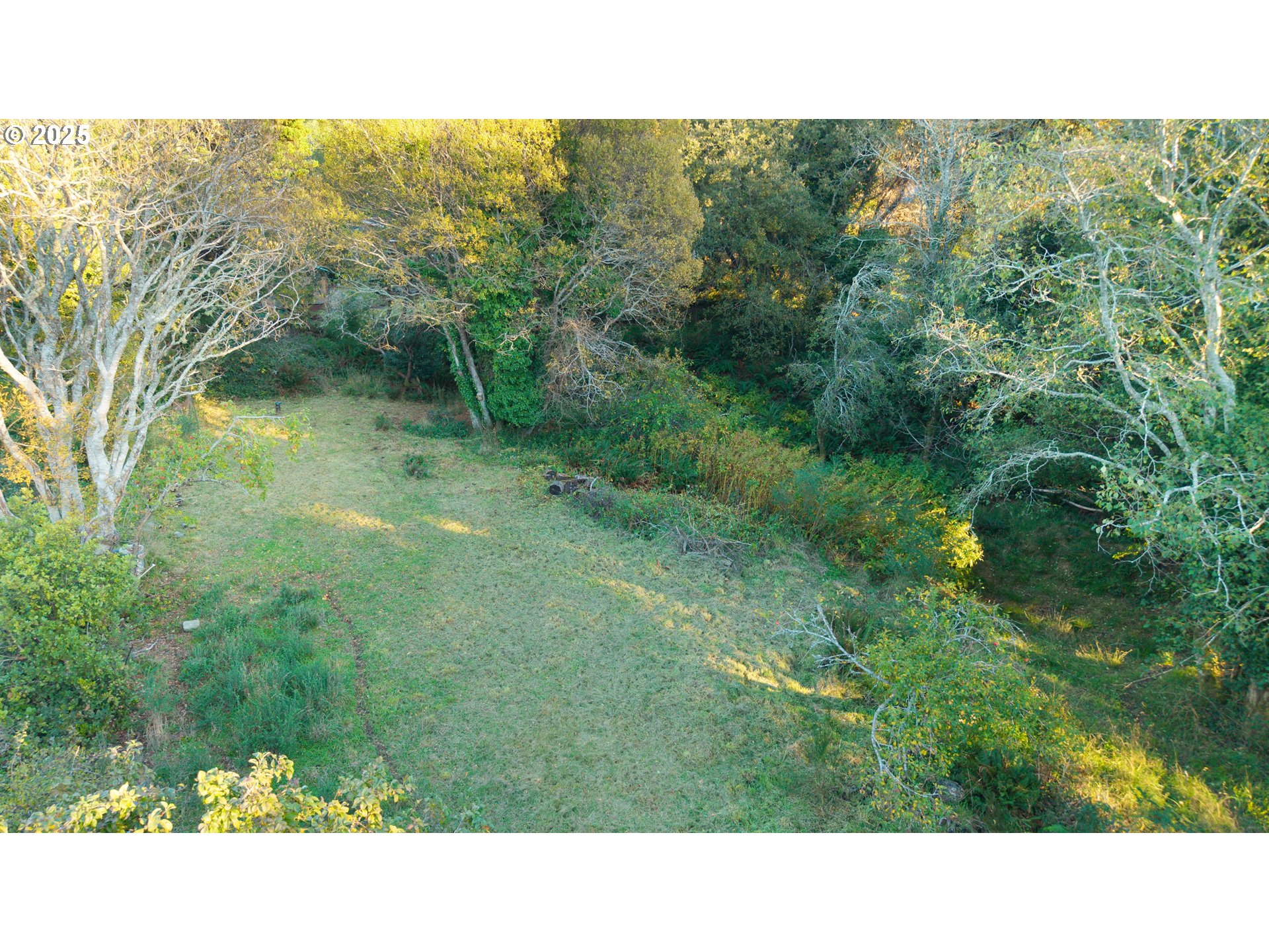 Washington Street Port Orford, OR 97465 - Photo 5 of 16 a black and white photo of a house