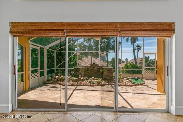 a bathroom with a granite countertop bathtub shower and toilet