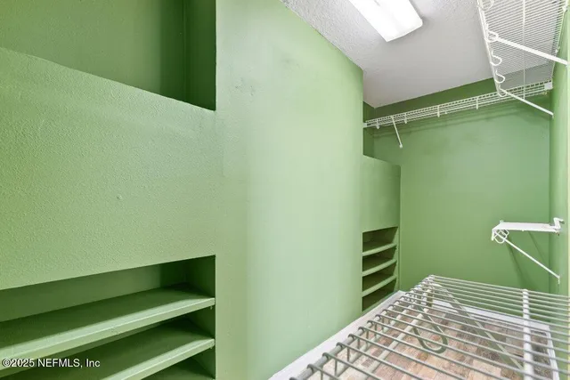 a swimming pool with outdoor seating yard and barbeque oven