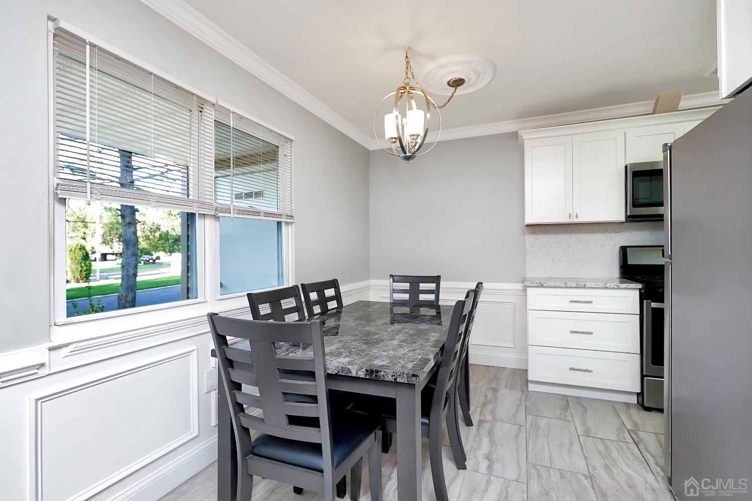 7 Haven Drive Old Bridge, NJ 07747 - Photo 12 of 24 a view of a dining room with furniture window and outside view