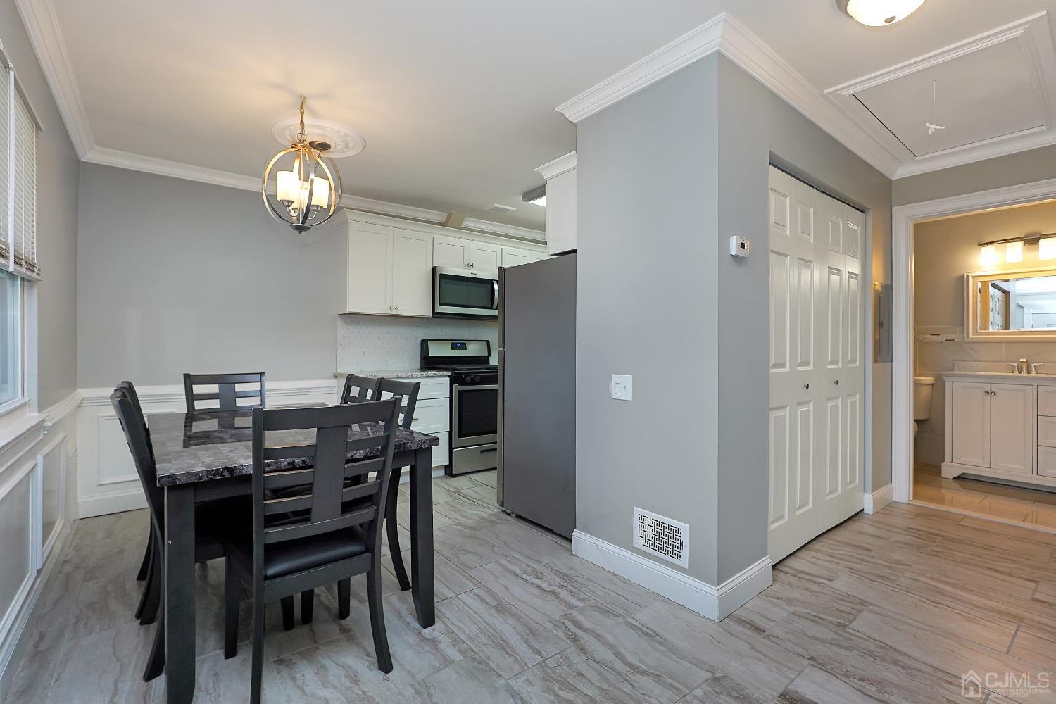 7 Haven Drive Old Bridge, NJ 07747 - Photo 13 of 24 a view of a dining room with furniture and wooden floor