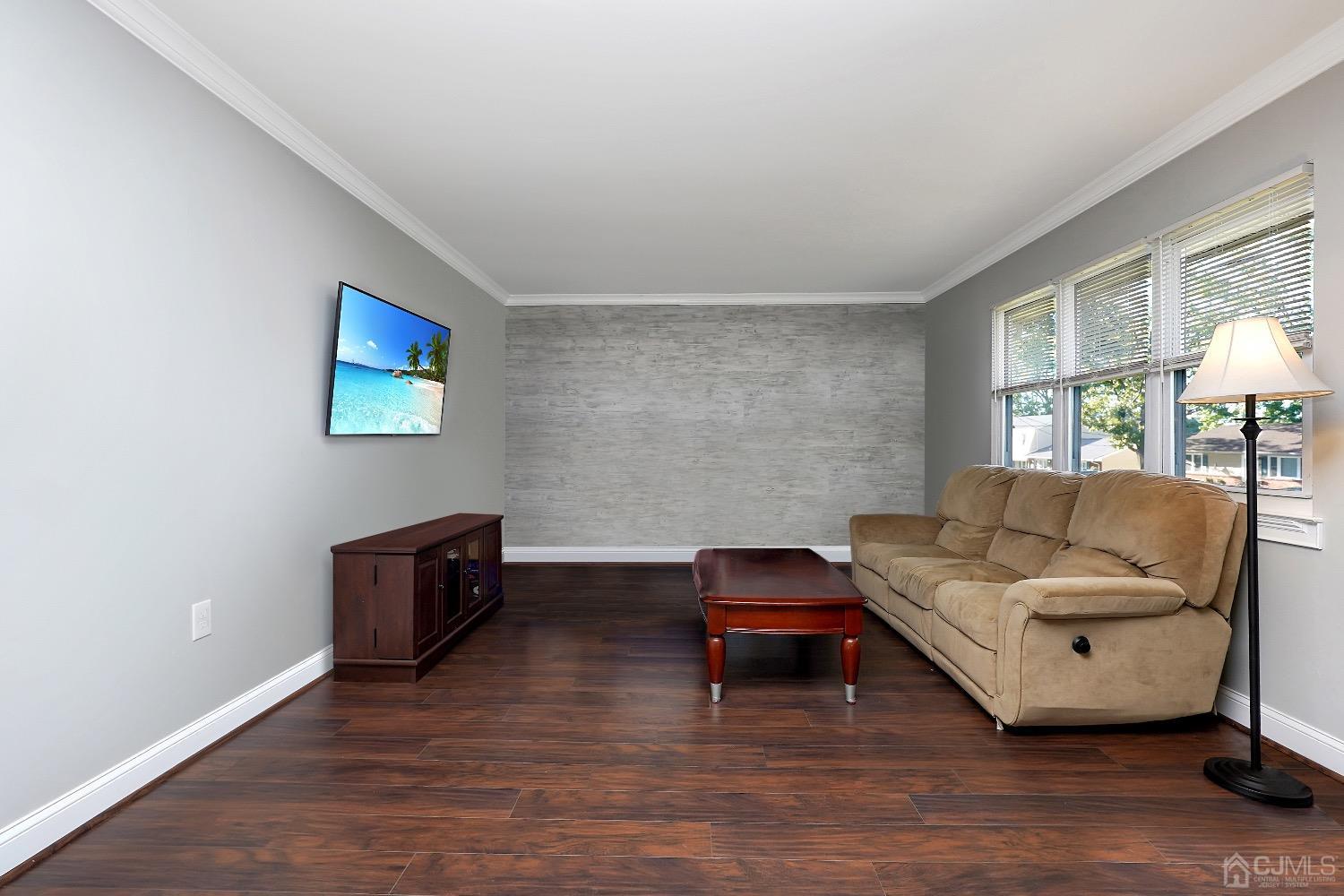 7 Haven Drive Old Bridge, NJ 07747 - Photo 15 of 24 a living room with furniture and a wooden floor