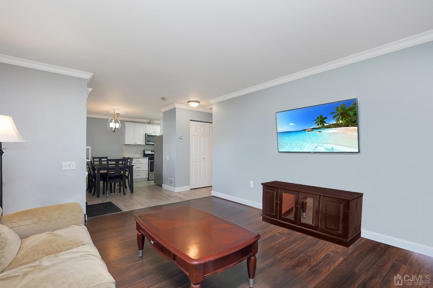 7 Haven Drive Old Bridge, NJ 07747 - Photo 16 of 24 a living room with furniture and a table