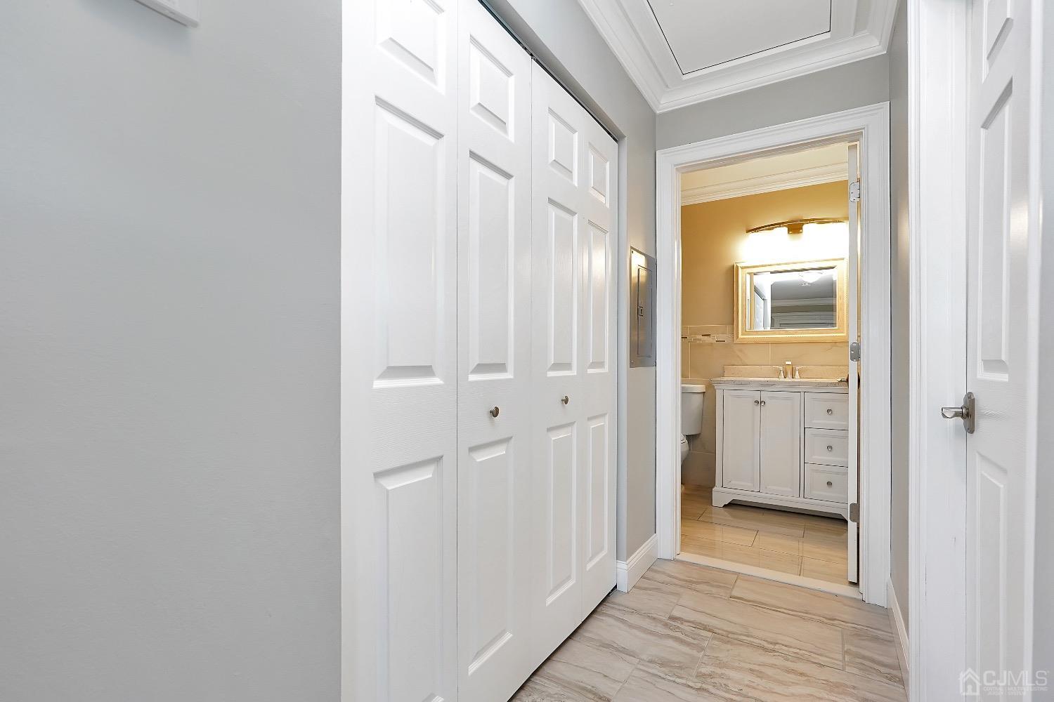 7 Haven Drive Old Bridge, NJ 07747 - Photo 17 of 24 a view of a bathroom from the hallway