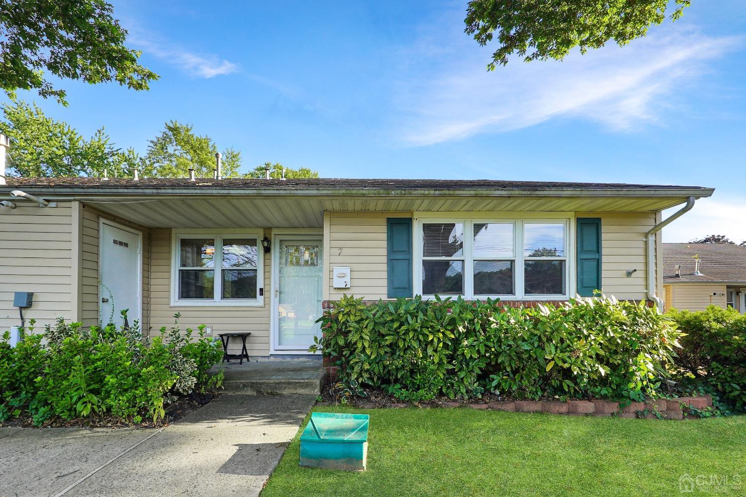 7 Haven Drive Old Bridge, NJ 07747 - Photo 2 of 24 front view of house with a yard