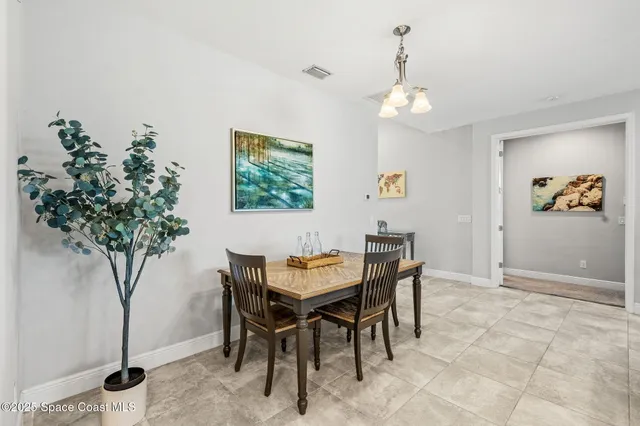 a kitchen with a sink stove and microwave
