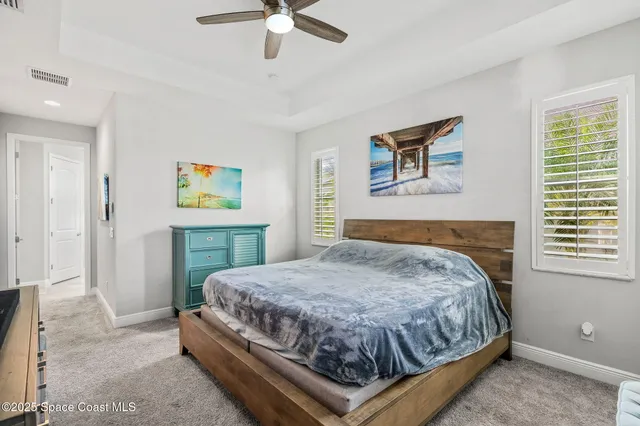 a bathroom with a double vanity sink mirror and shower