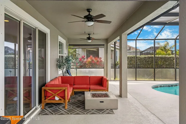 a view of a swimming pool with a sitting space