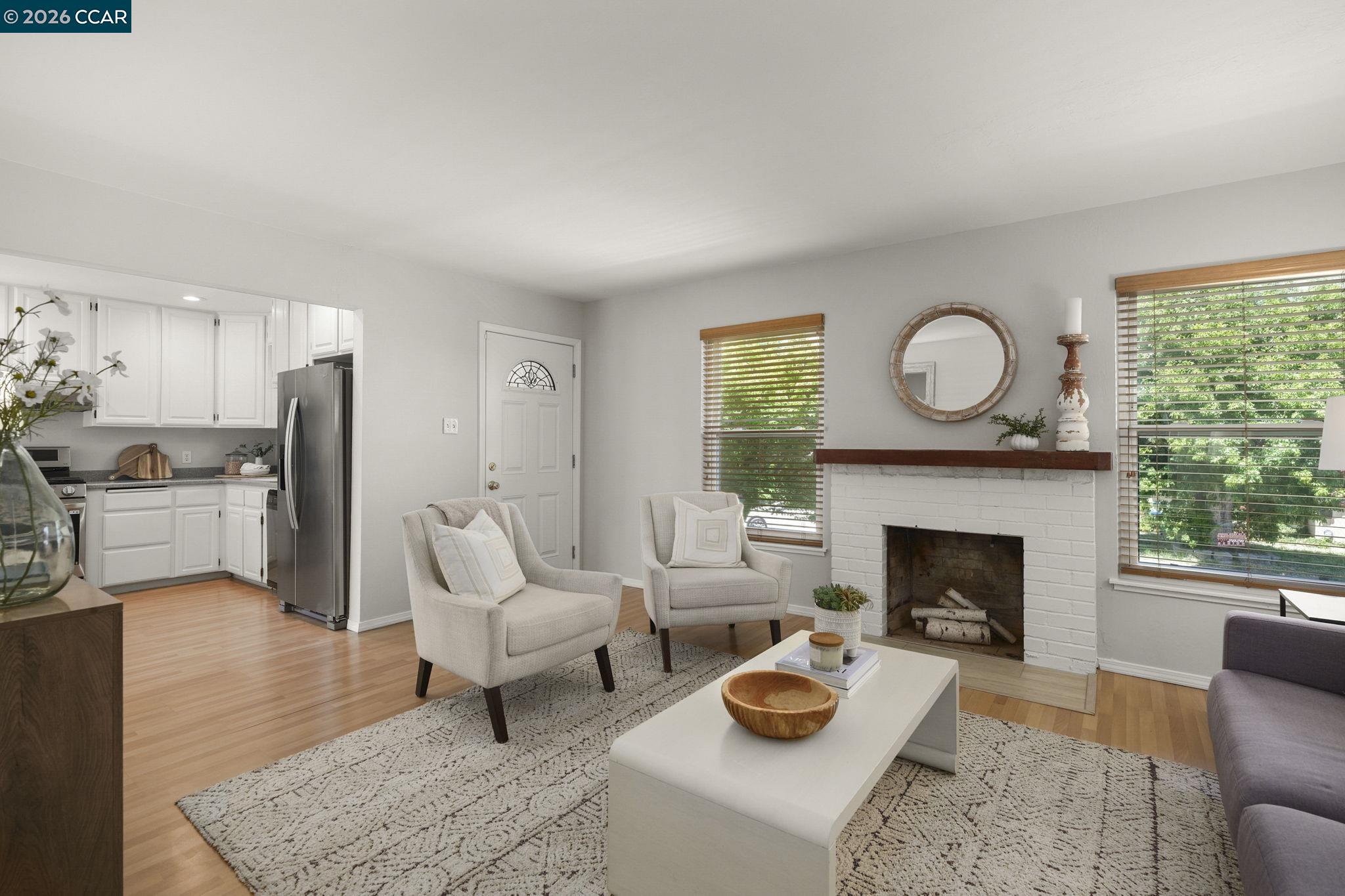 4311 Cowell Road Concord, CA 94521 - Photo 7 of 29 a living room with furniture and a fireplace