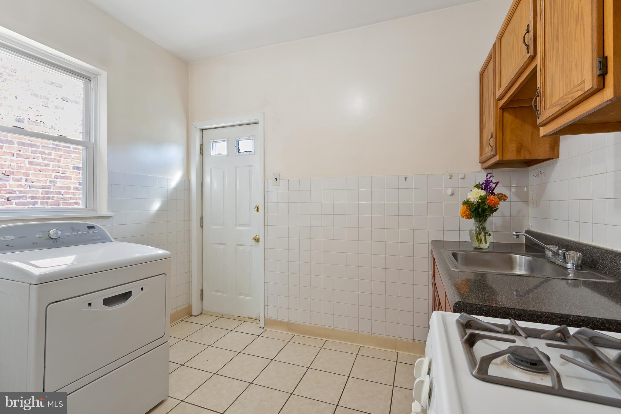 934 North Fourth Street Camden, NJ 08102 - Photo 14 of 34 a bathroom with a sink toilet and vanity
