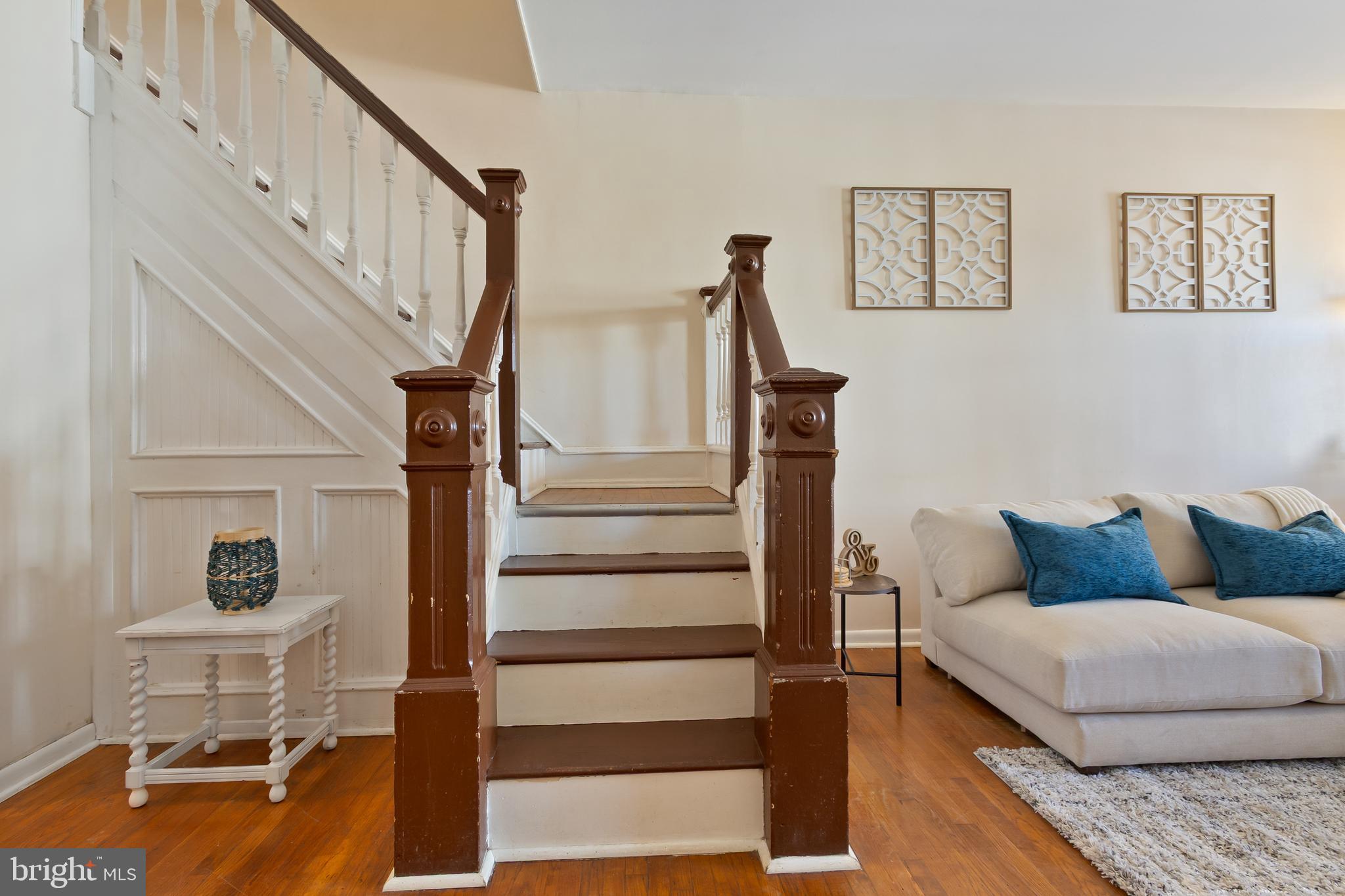 934 North Fourth Street Camden, NJ 08102 - Photo 15 of 34 a living room with furniture and a wooden floor