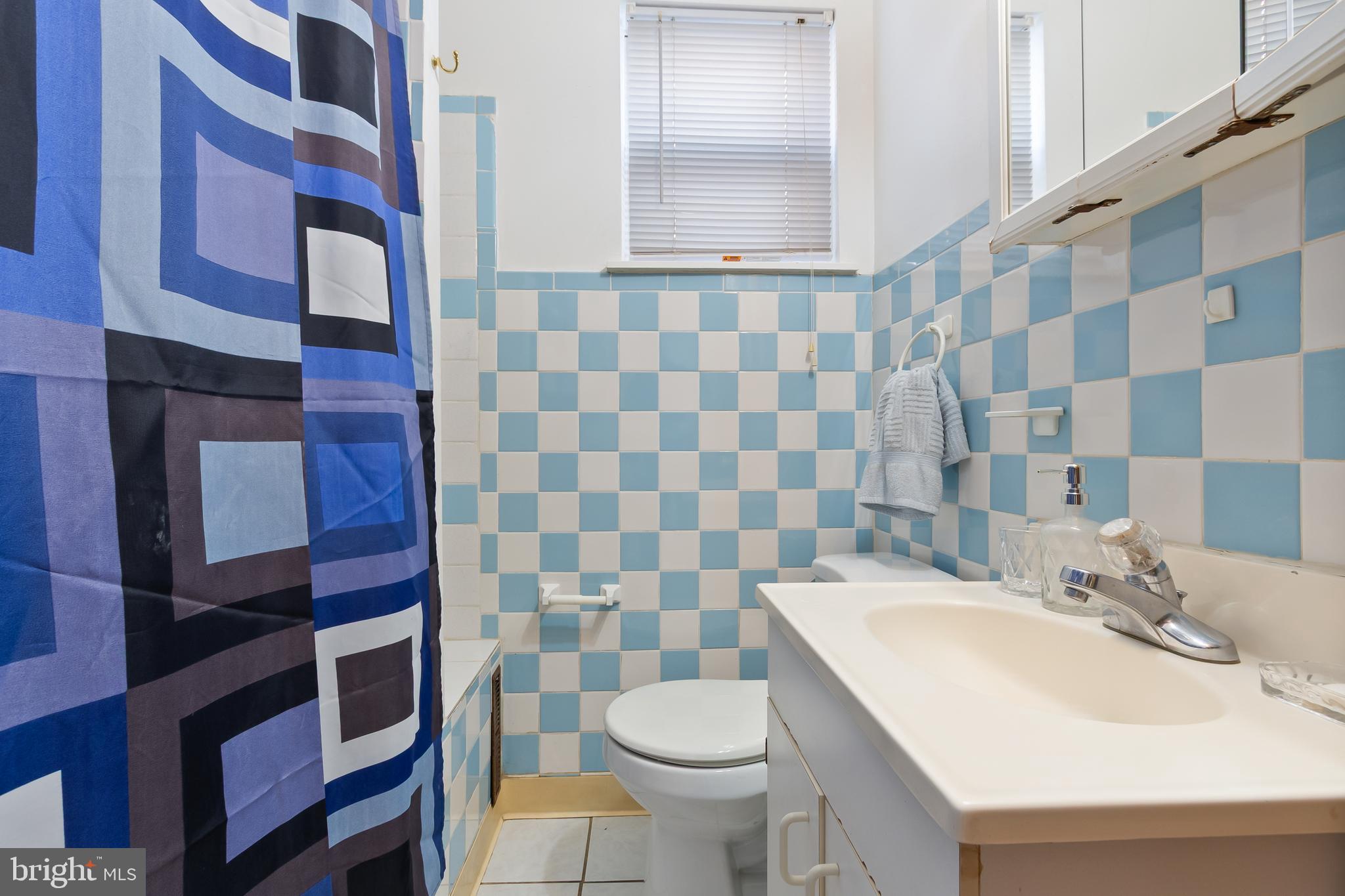 934 North Fourth Street Camden, NJ 08102 - Photo 23 of 34 a bathroom with a sink toilet and shower