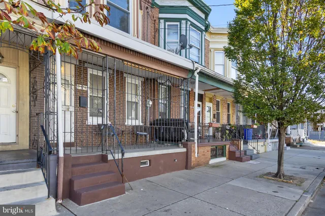 a view of a building with a glass door