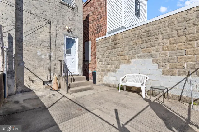 a building outdoor space with patio furniture