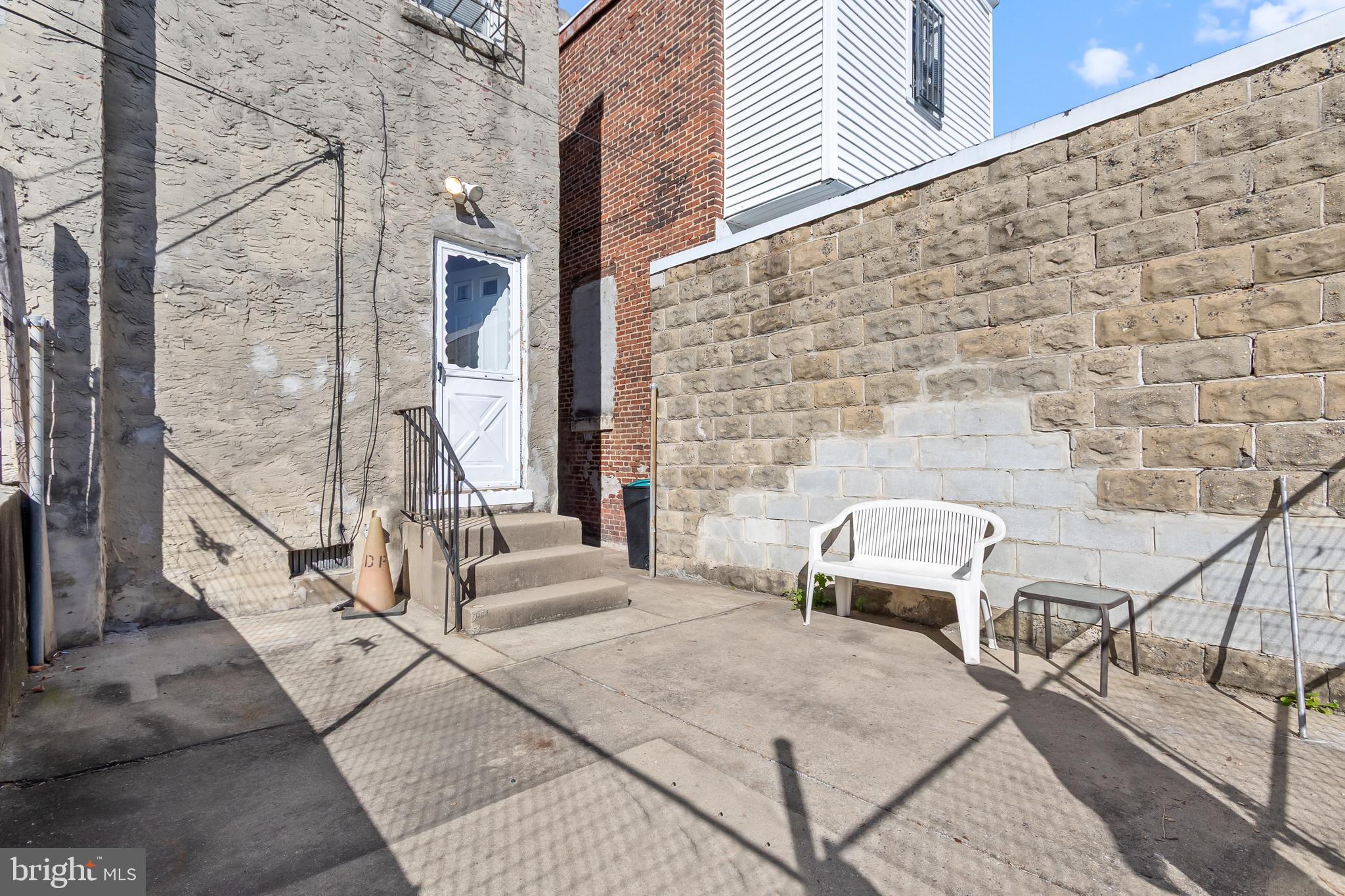 934 North Fourth Street Camden, NJ 08102 - Photo 32 of 34 a building outdoor space with patio furniture