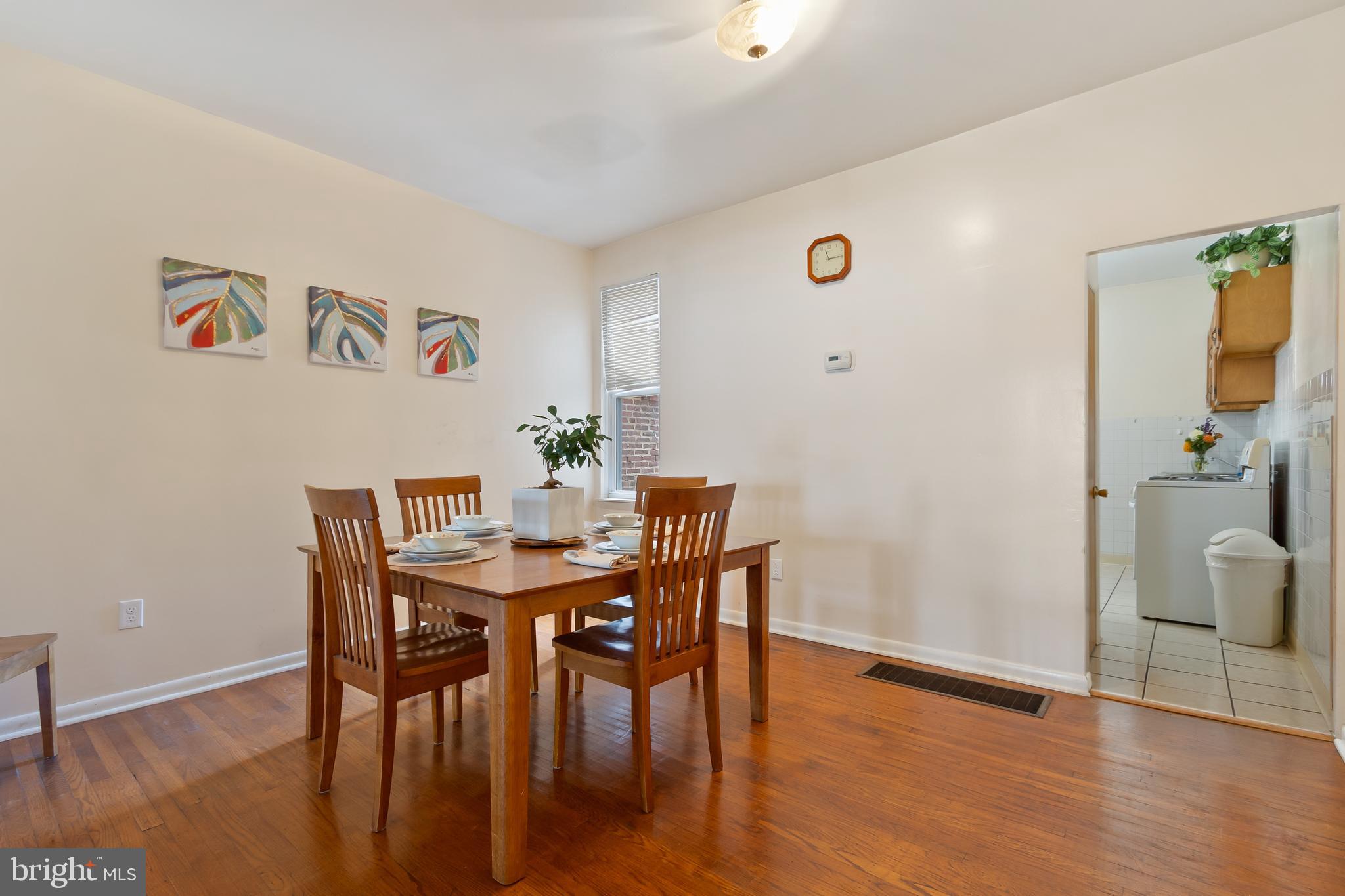 934 North Fourth Street Camden, NJ 08102 - Photo 9 of 34 a view of a dining room with furniture and wooden floor