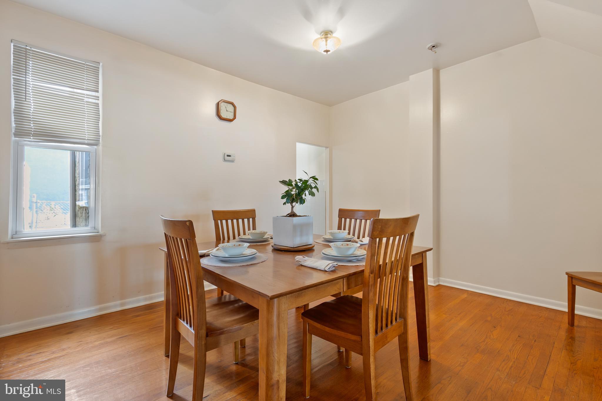 934 North Fourth Street Camden, NJ 08102 - Photo 10 of 34 a view of a dining room with furniture and wooden floor