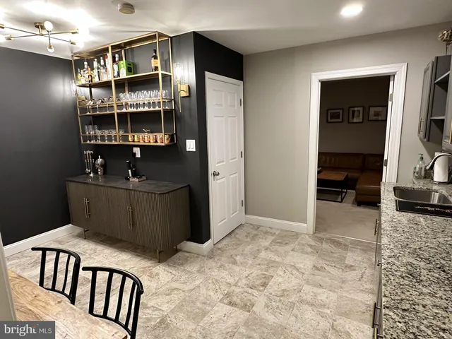 a view of a livingroom with shelves
